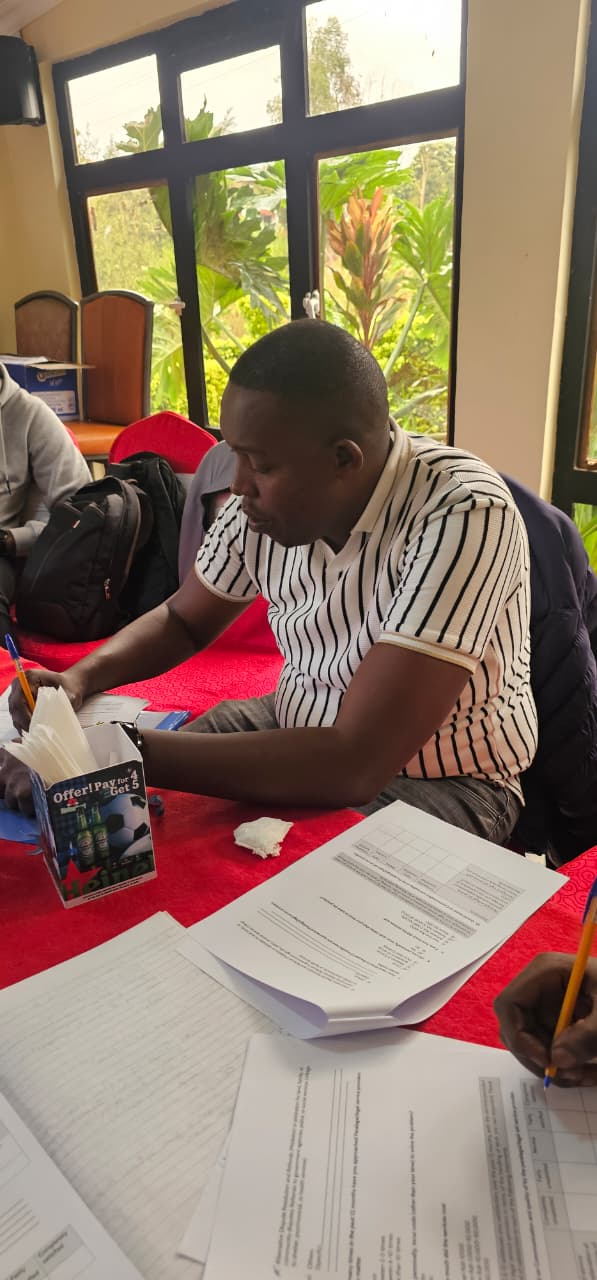 Workshop participants reviewing training materials